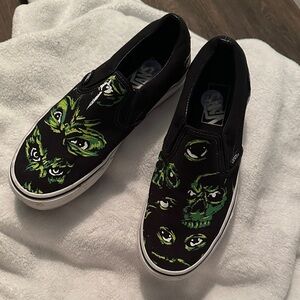 Vans Black Slip-Ons with Green Eye Pattern